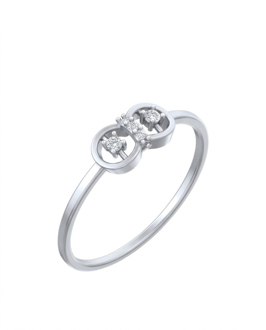 White gold ring with diamond accents on a white background


