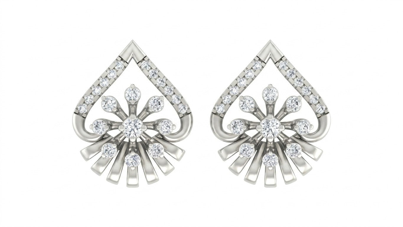 Pair of white gold and diamond earrings with diamond accents on a white background.
