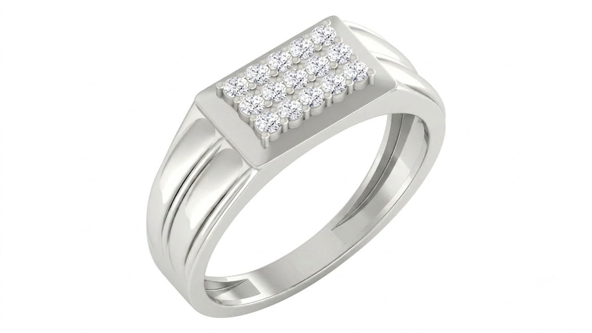 A white gold ring with a rectangular pavé diamond setting, shown on a plain white background.