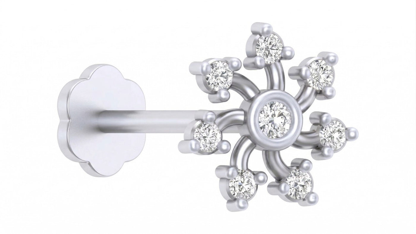 Elegant white gold and diamond stud nose pin snowflake-inspired featuring sparkling diamonds in floral arrangement.pin