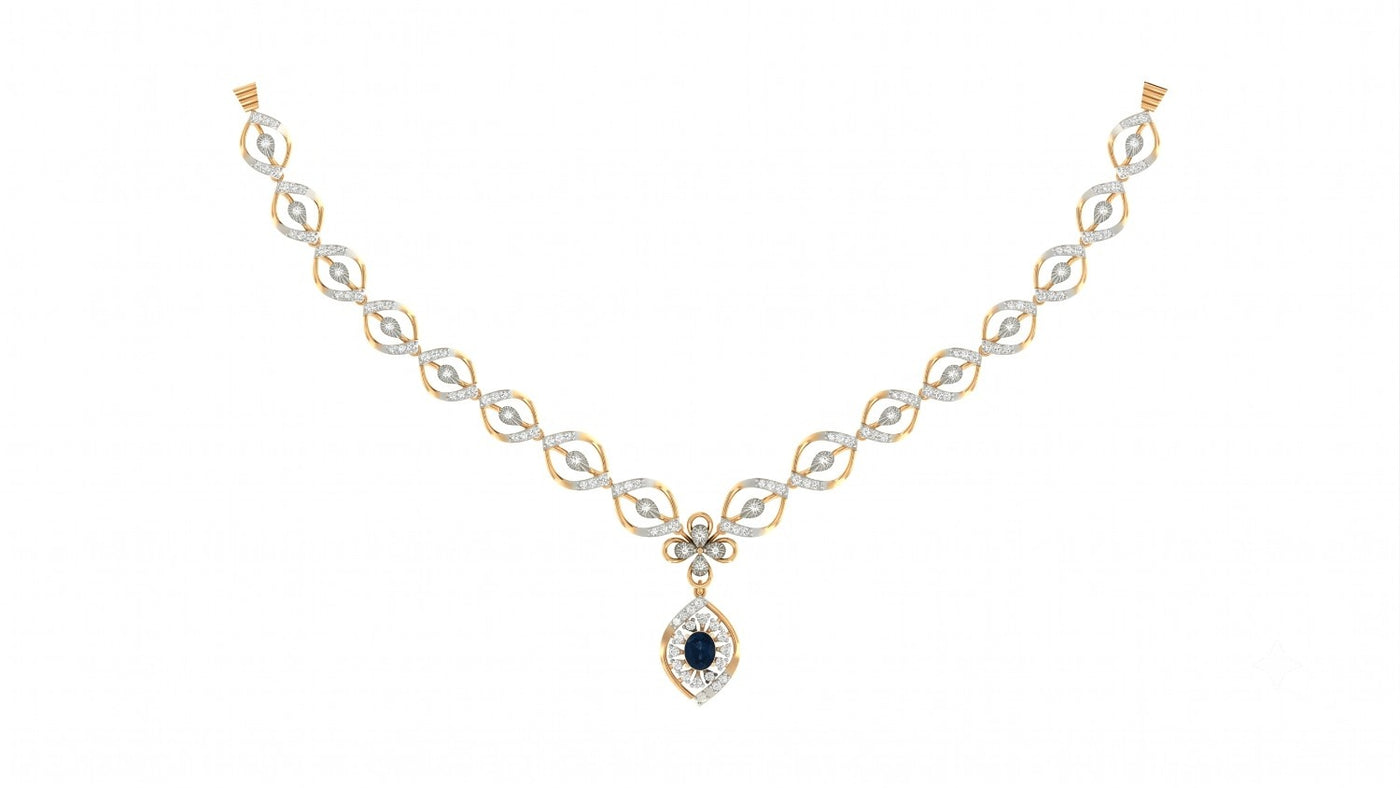 A yellow gold and diamond necklace with a teardrop-shaped pendant featuring a sapphire center gemstone, displayed on a solid white background.