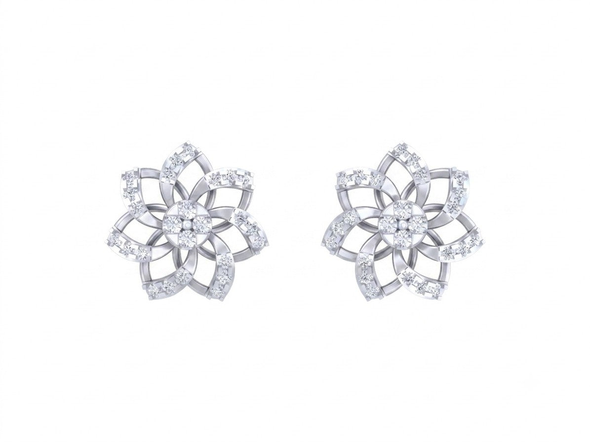 A pair of white gold and diamond flower-shaped stud earrings, displayed on a solid white background.