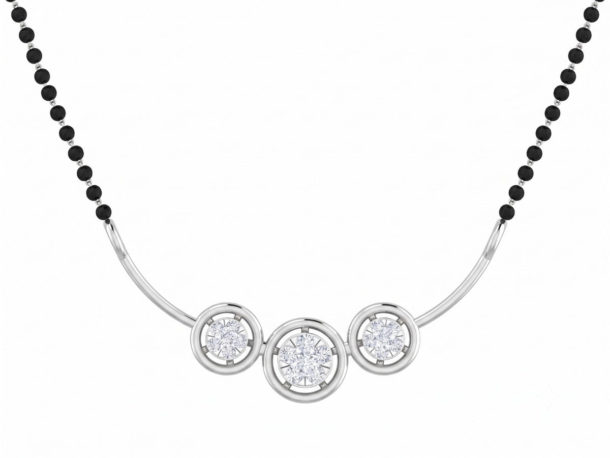 White gold and diamond mangalsutra with circular designs on white background