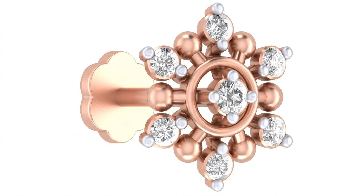 Rose Gold and diamond stud nose pin-like stones on a white background