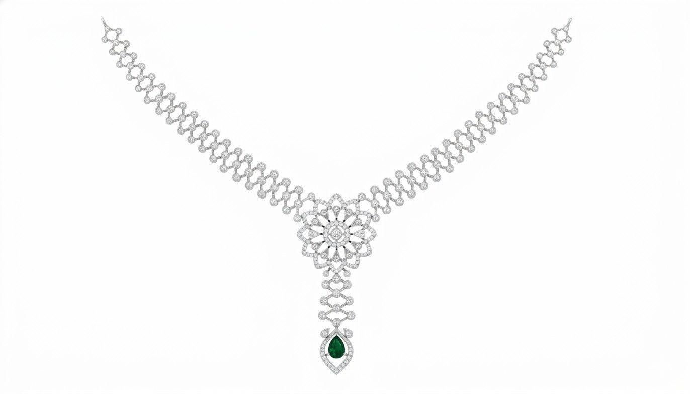 White gold necklace with emerald design on a white background