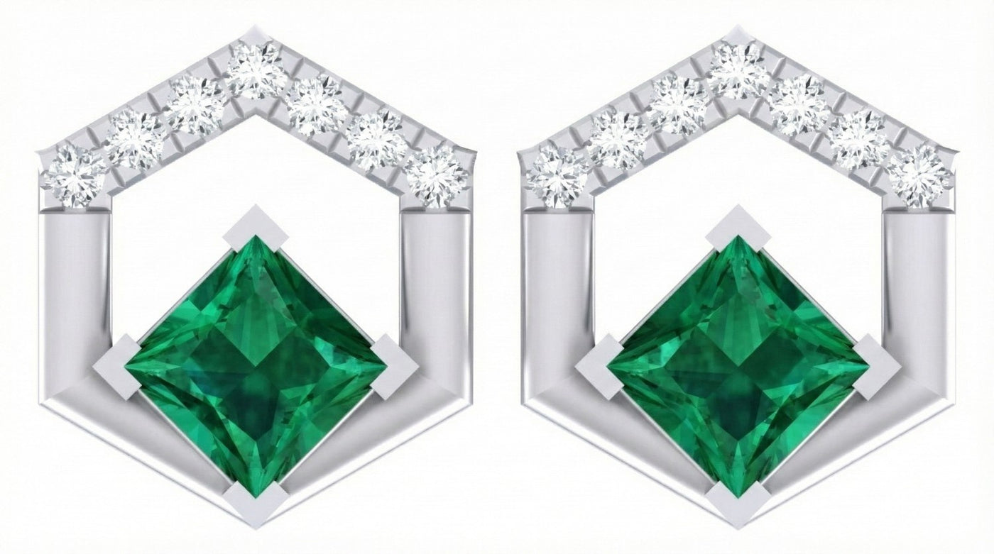 A pair of geometric, two-tone white gold open-hexagon earrings featuring central square green gemstones