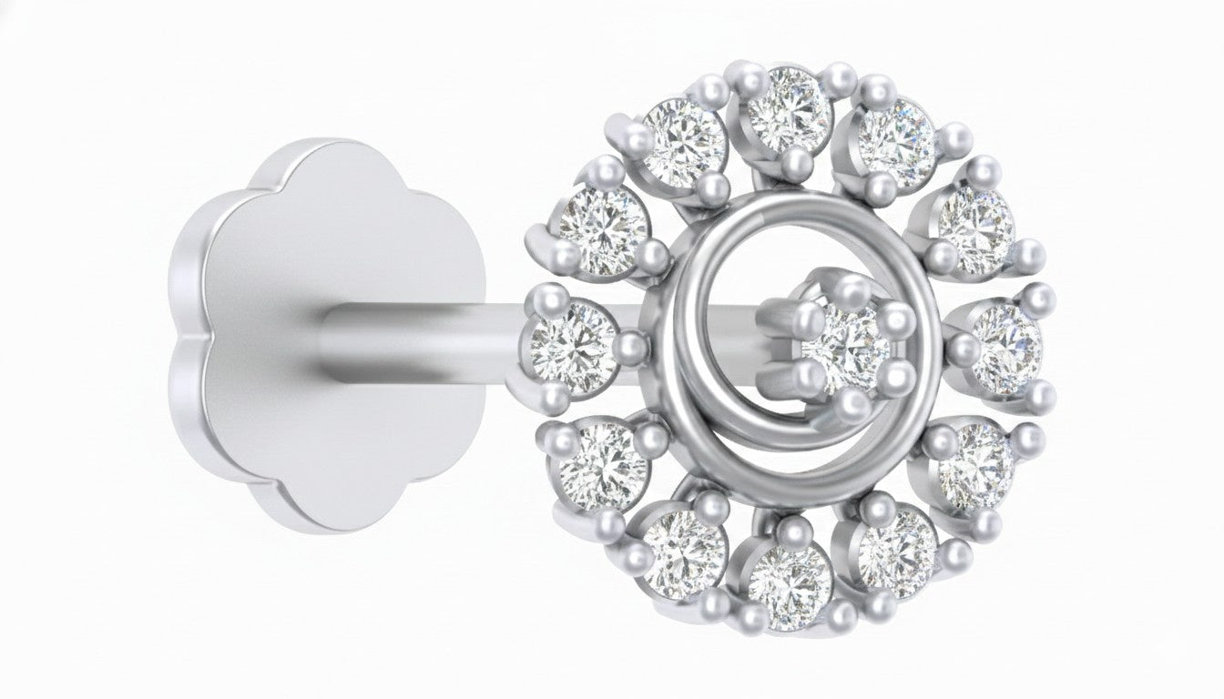 white gold and diamond stud nose pin on a white background 