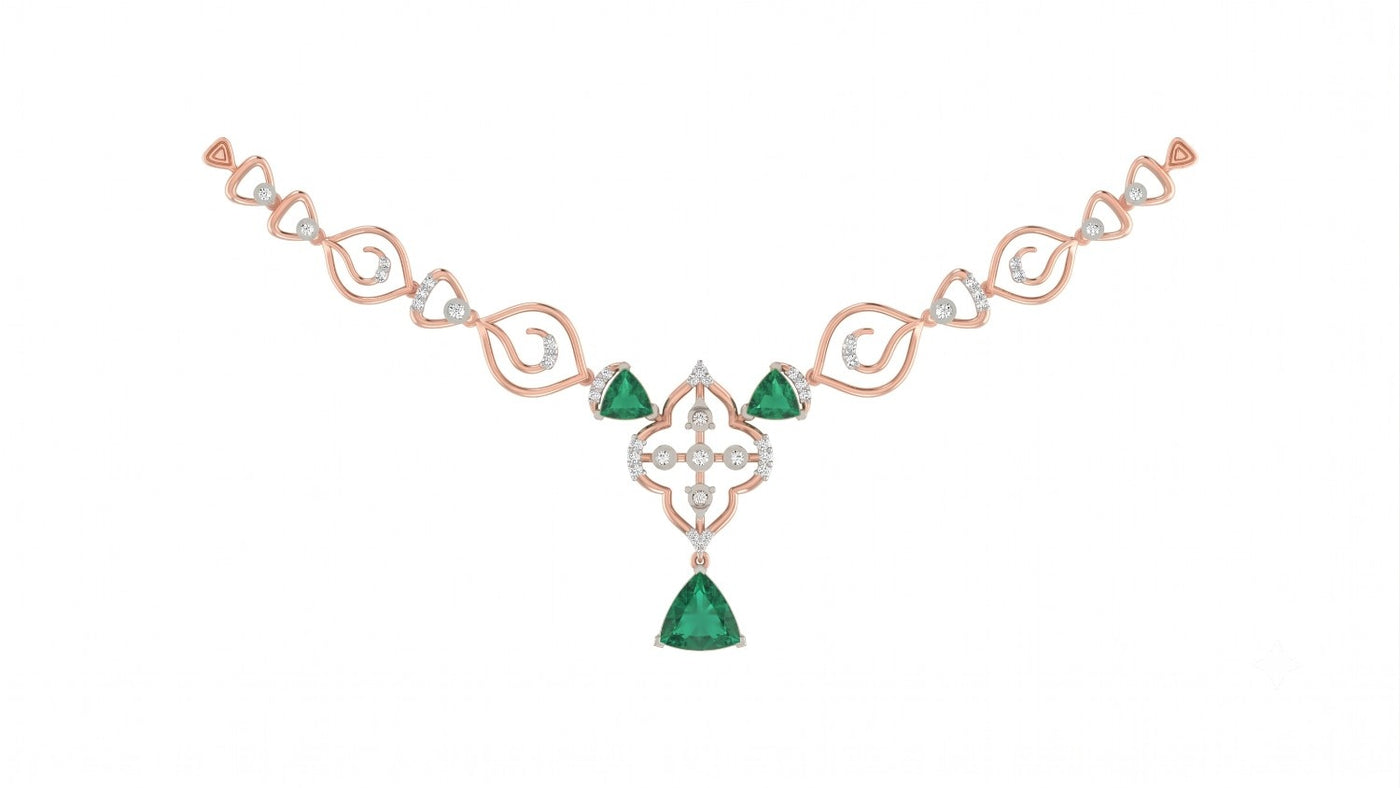 Rose gold and diamond necklace with three trillion-cut emeralds, diamond accents, and floral-design.