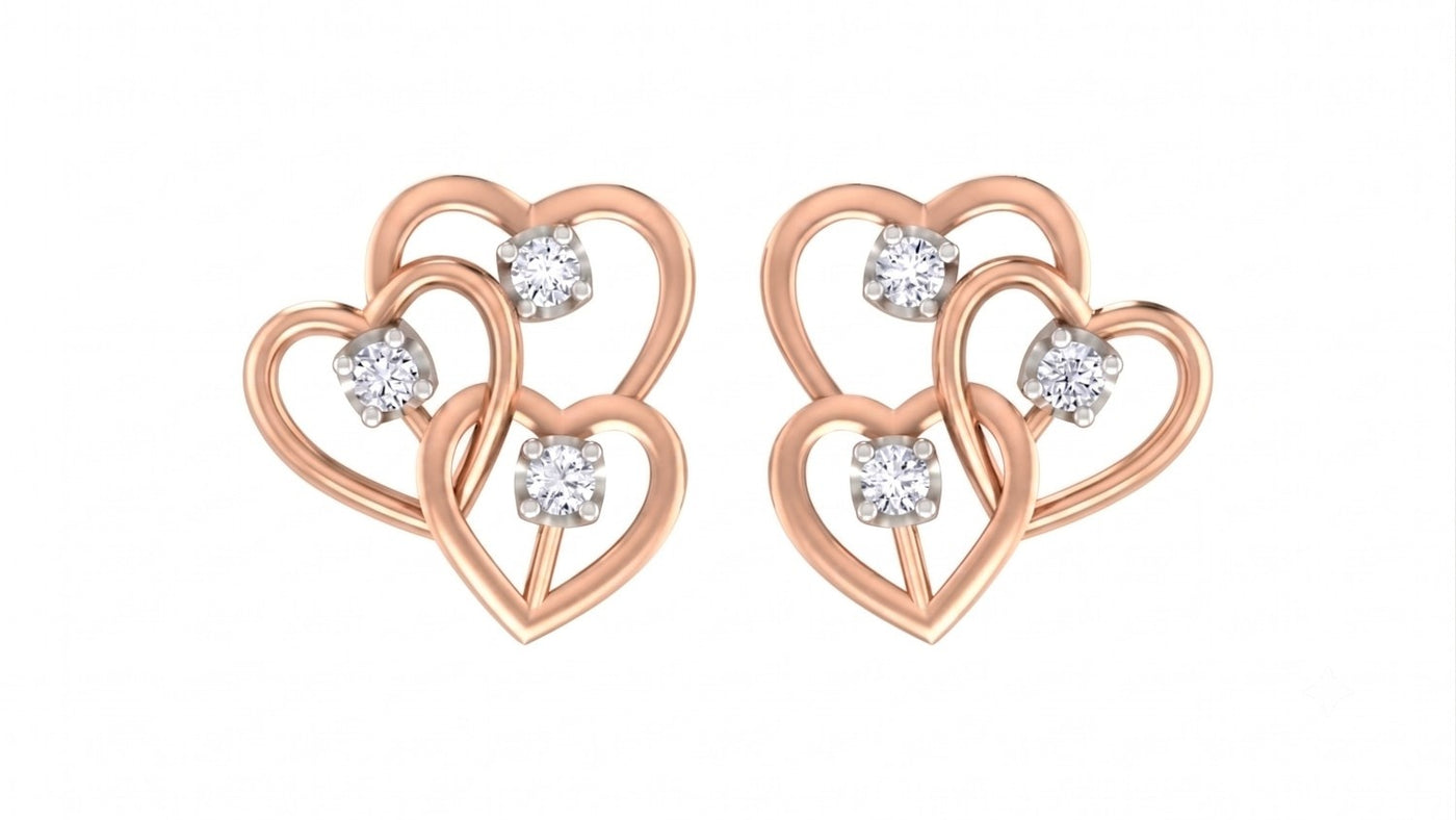 Rose gold and diamond heart-shaped earrings on a white background
