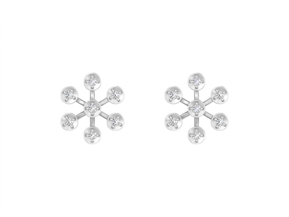 White gold and diamond floral stud earring on a white background.