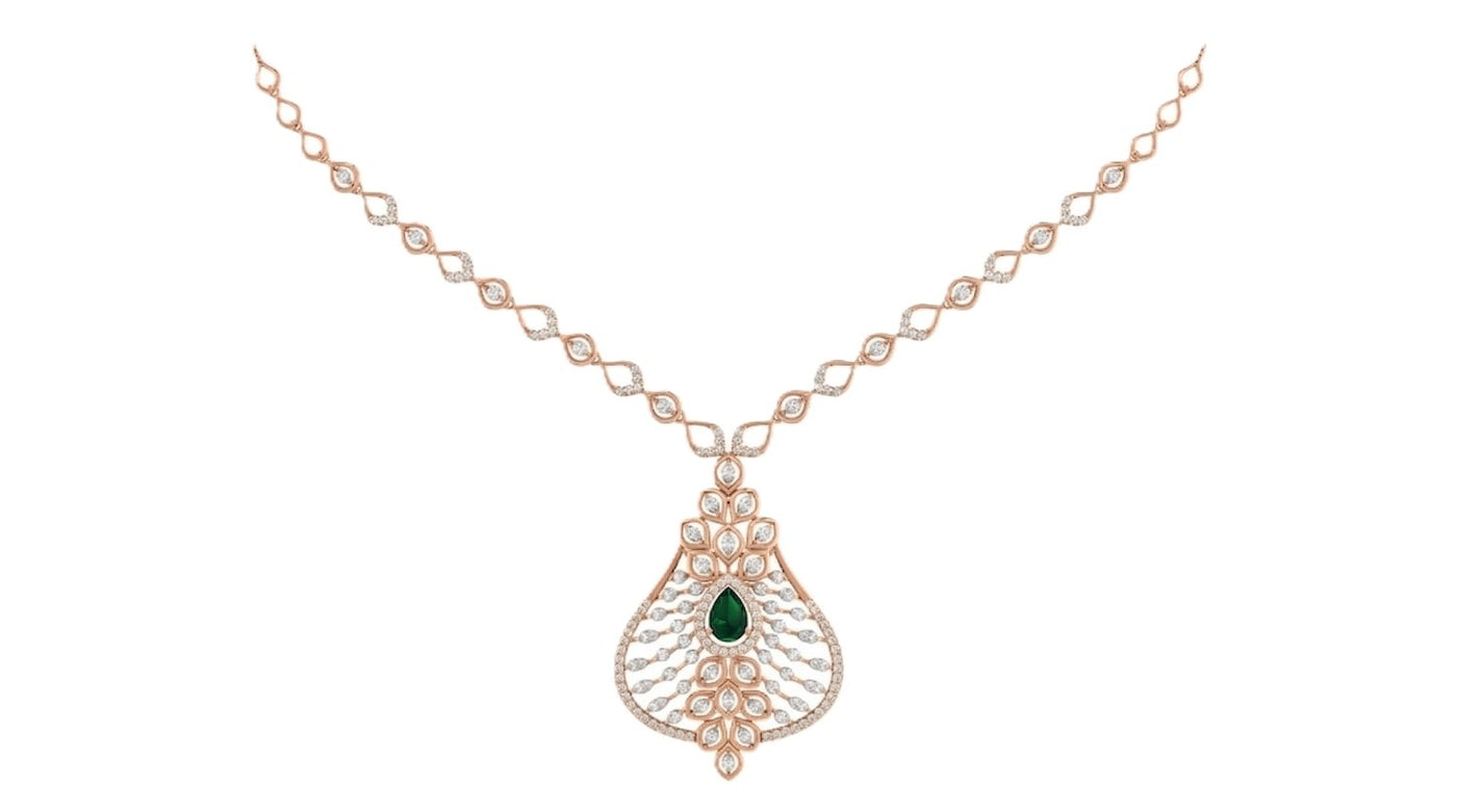 Rose gold necklace with a green gemstone on a white background