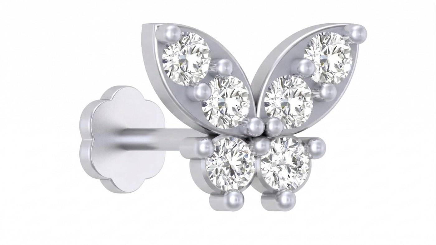 Butterfly-shaped White gold diamond and stud nose pin-like stones on a white background
