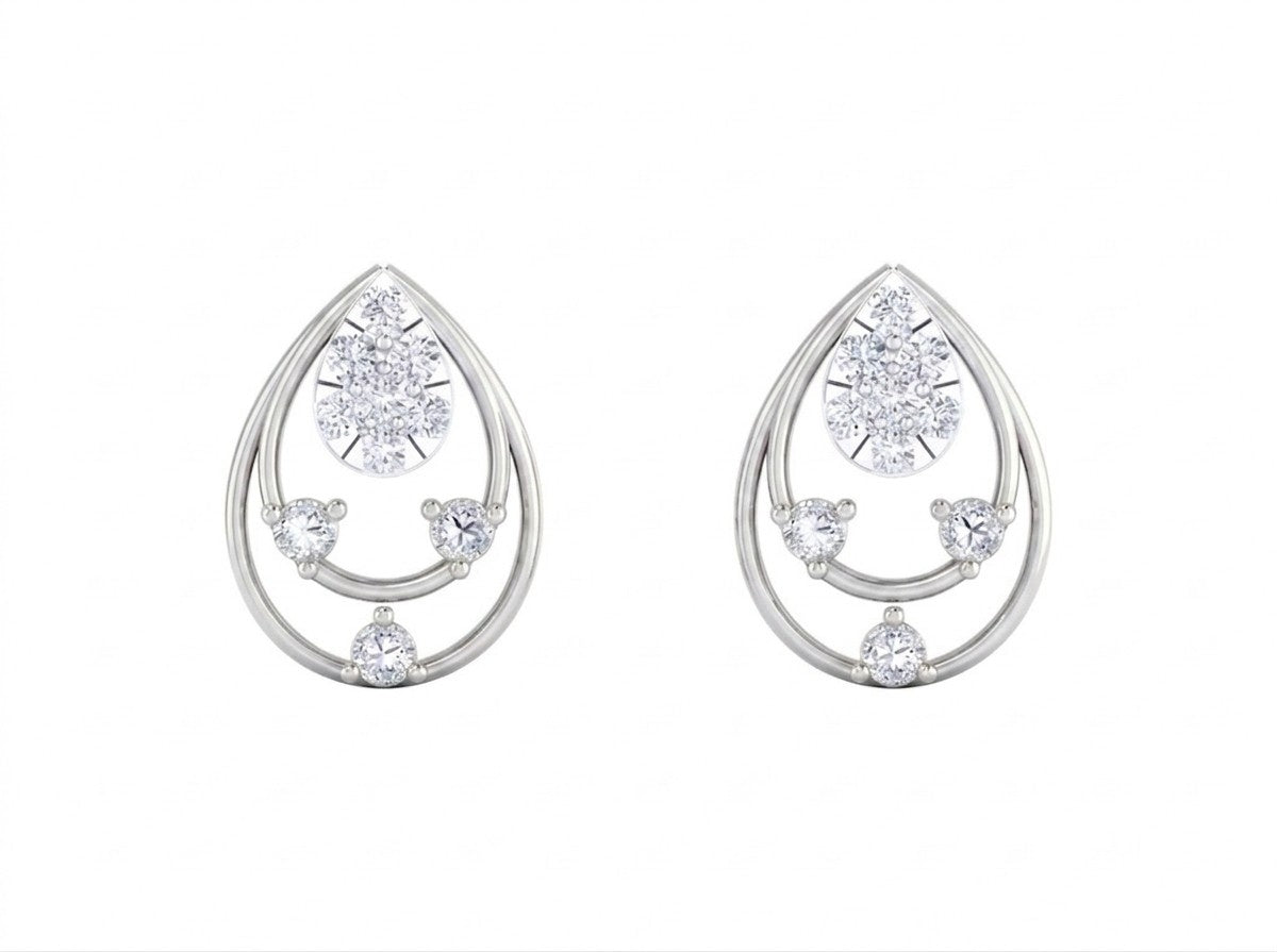 White gold and diamond stud earring with teardrop-design on a white background.