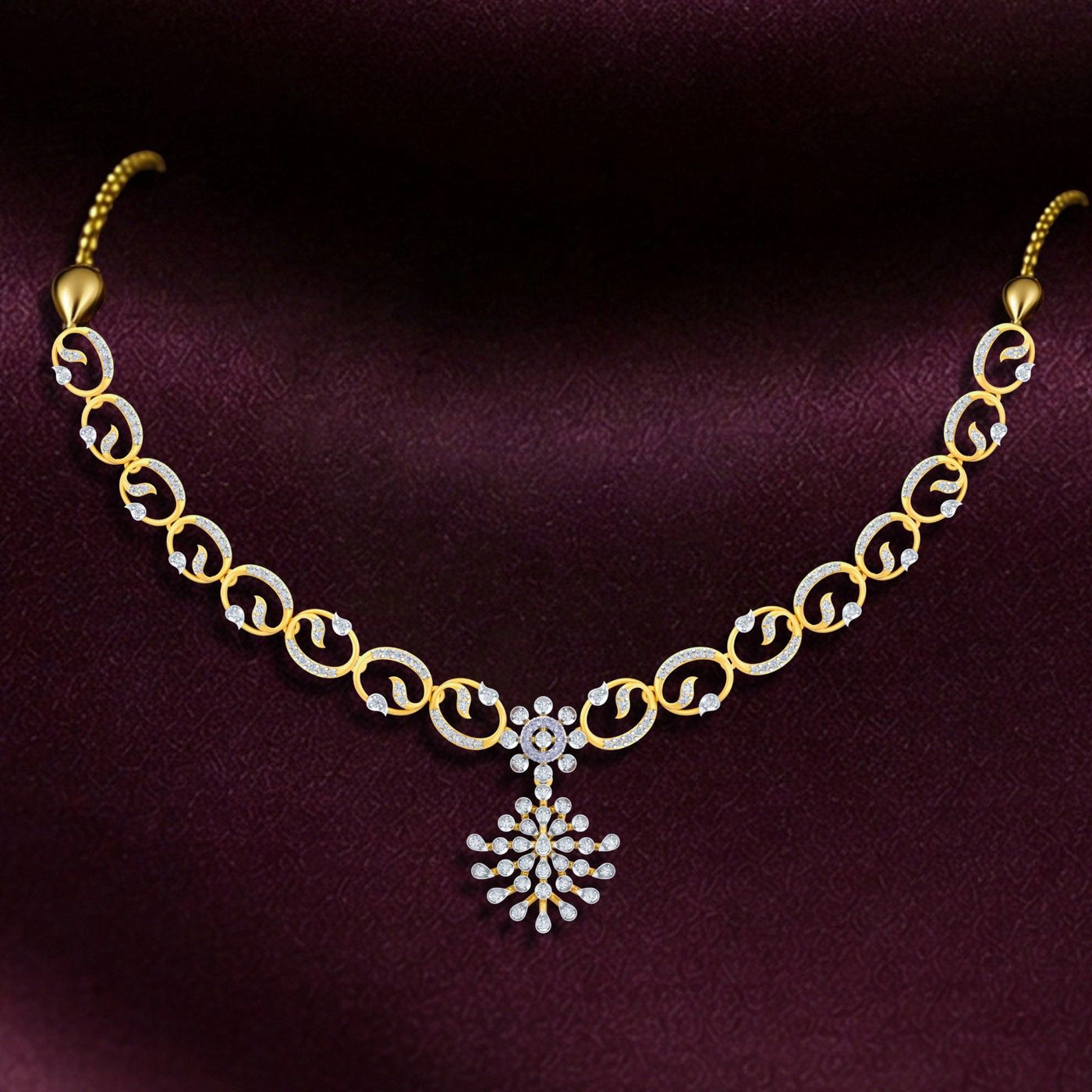 Gold and diamond necklace on a dark purple background.