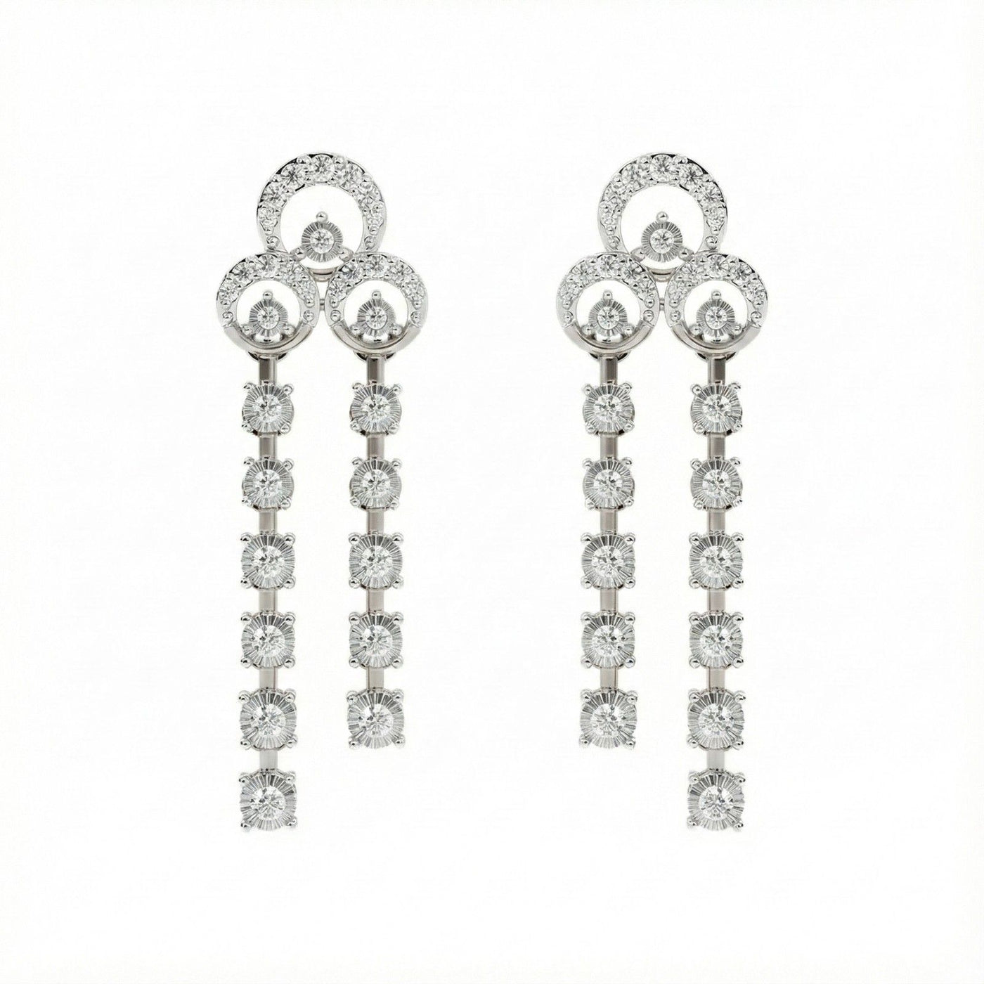 A pair of white gold earrings with multiple diamond accents along the length of each earring, featuring a timeless design.