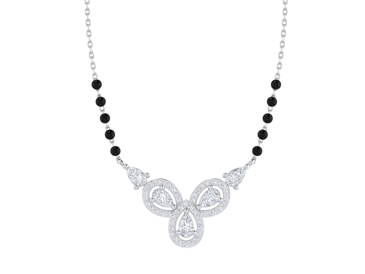 white gold and diamond mangalsutra with black beads and silver butterfly on a white background
