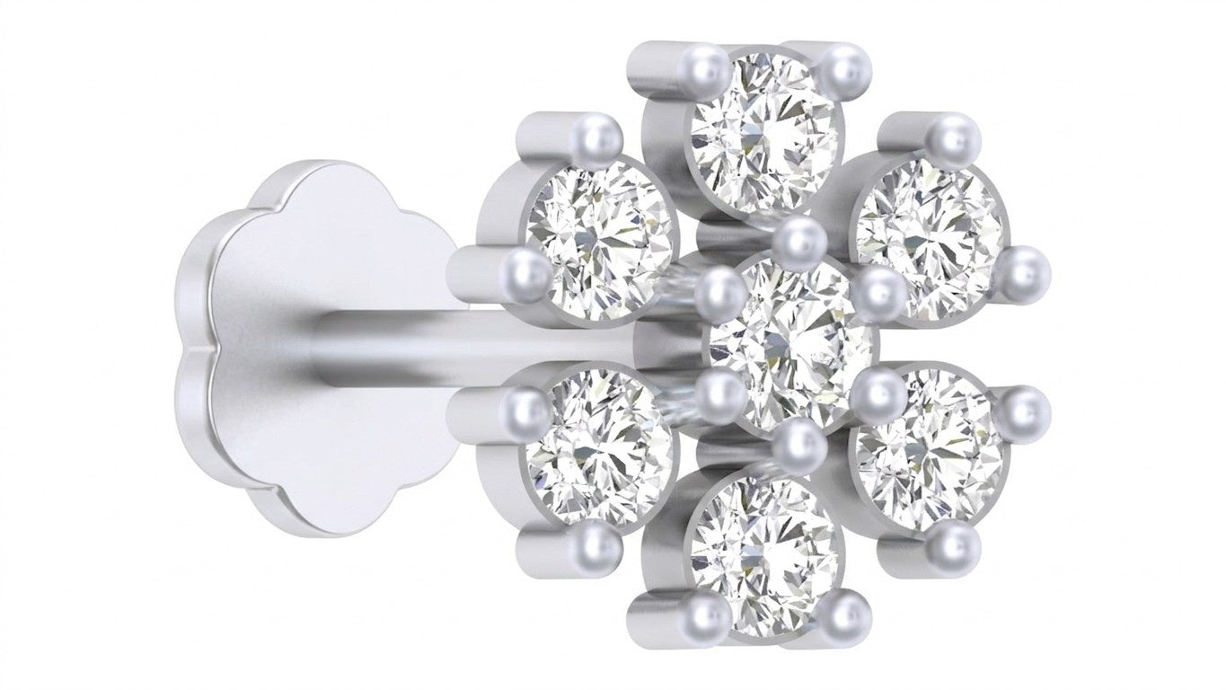 white gold and diamond stud nose pin on a white background