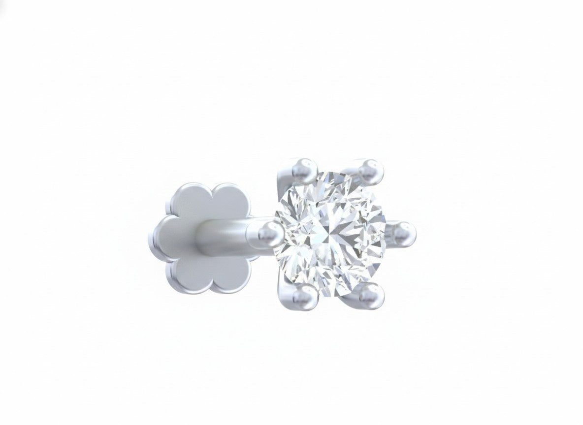 white gold and diamond stud nosepin on a white background