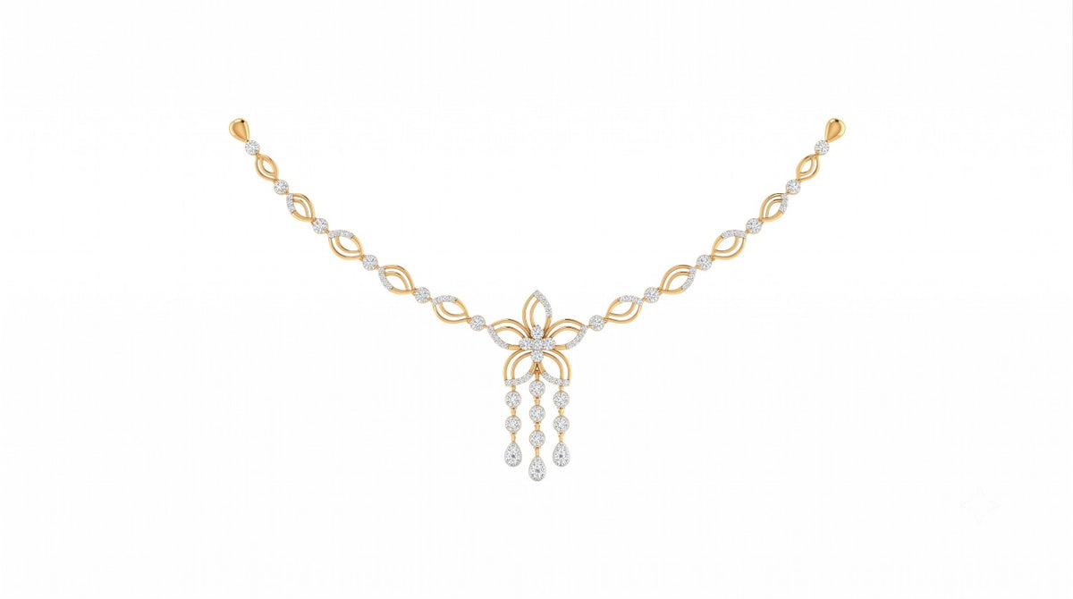 A yellow gold and diamond necklace with a central floral motif and dangling teardrop charms, displayed on a solid white background.