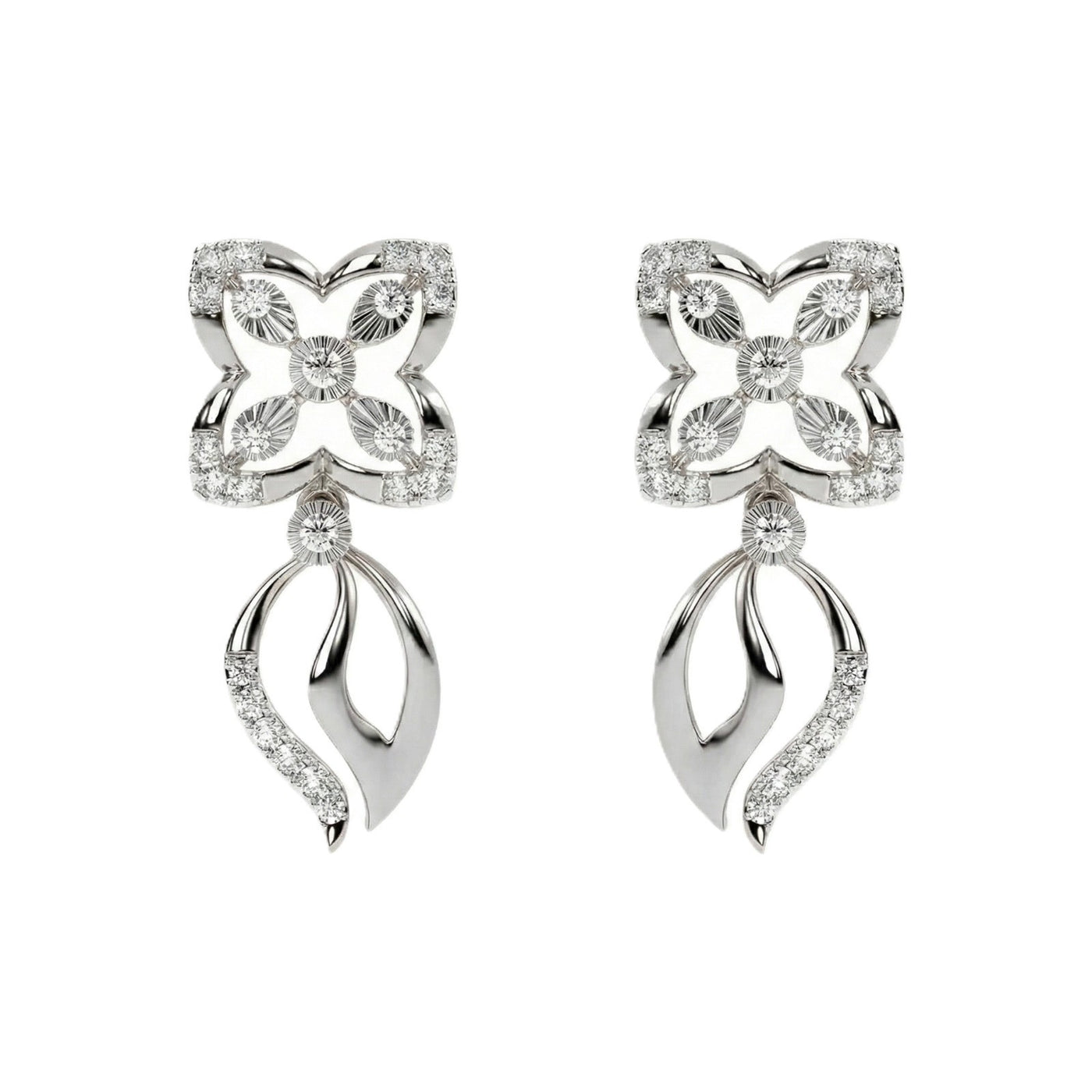 A pair of white gold and diamond dangler earrings with floral motif on the top and curved leaf-like drops below, set against a plain white background.