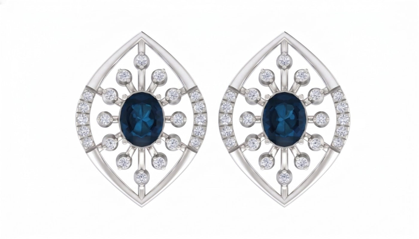 White gold and diamond stud earring with sapphire on a white background.