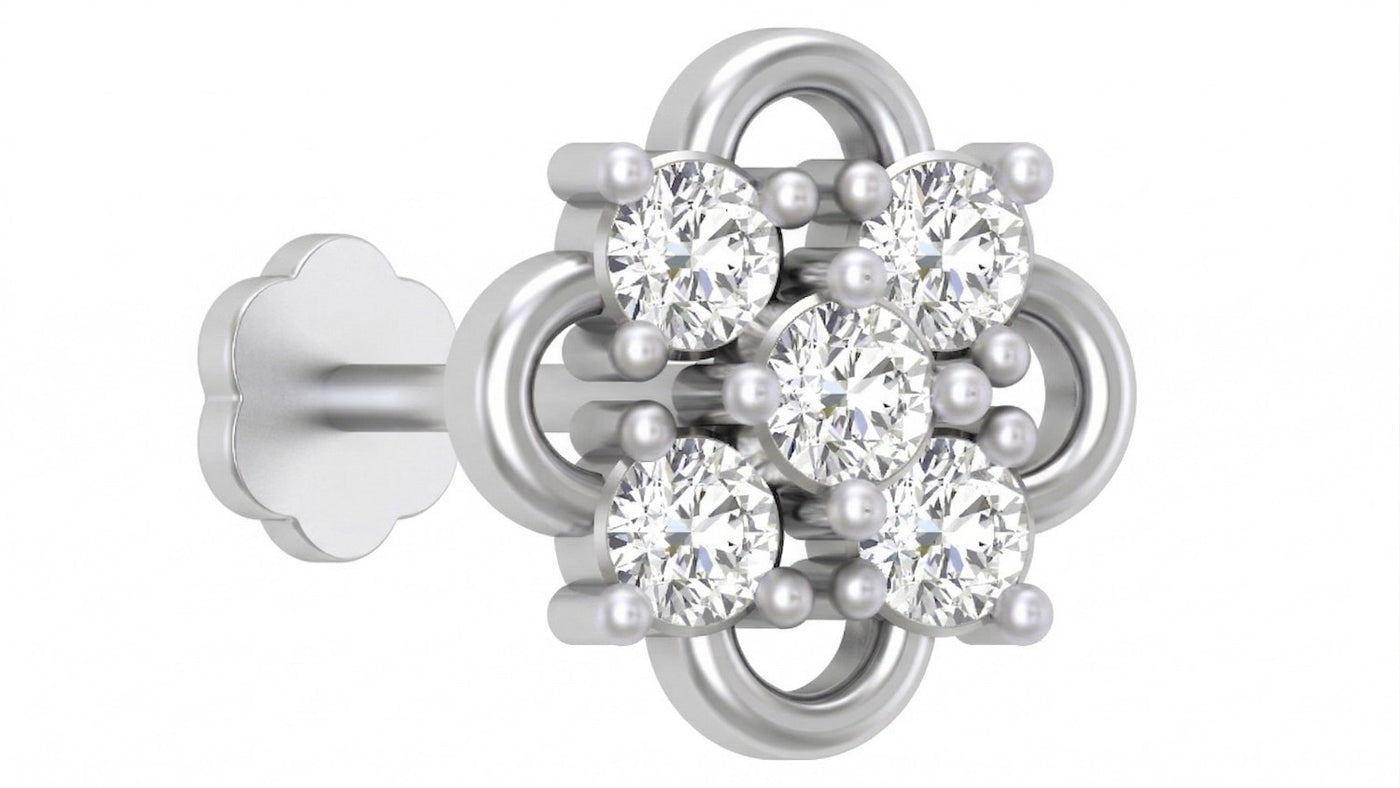 white gold and diamond stud nose pin on a white background