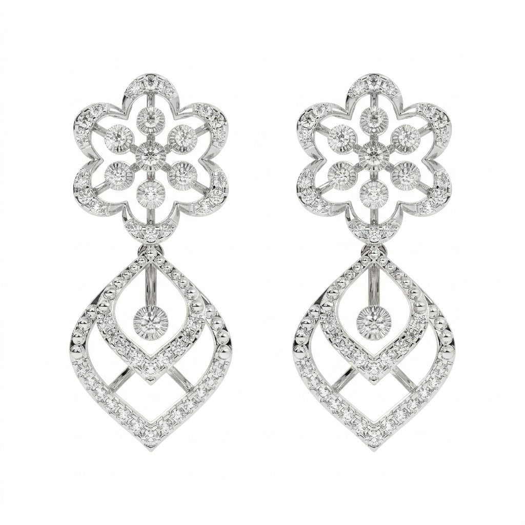 Pair of white gold and diamond dangler stud earrings on a white background