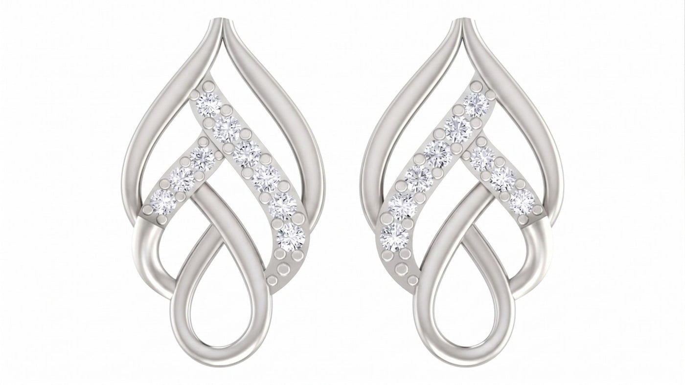 White gold and diamond leaf-design earring on a white background.