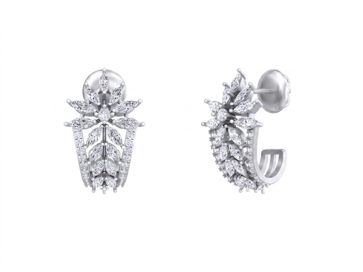 White gold and diamond earrings on a white background

