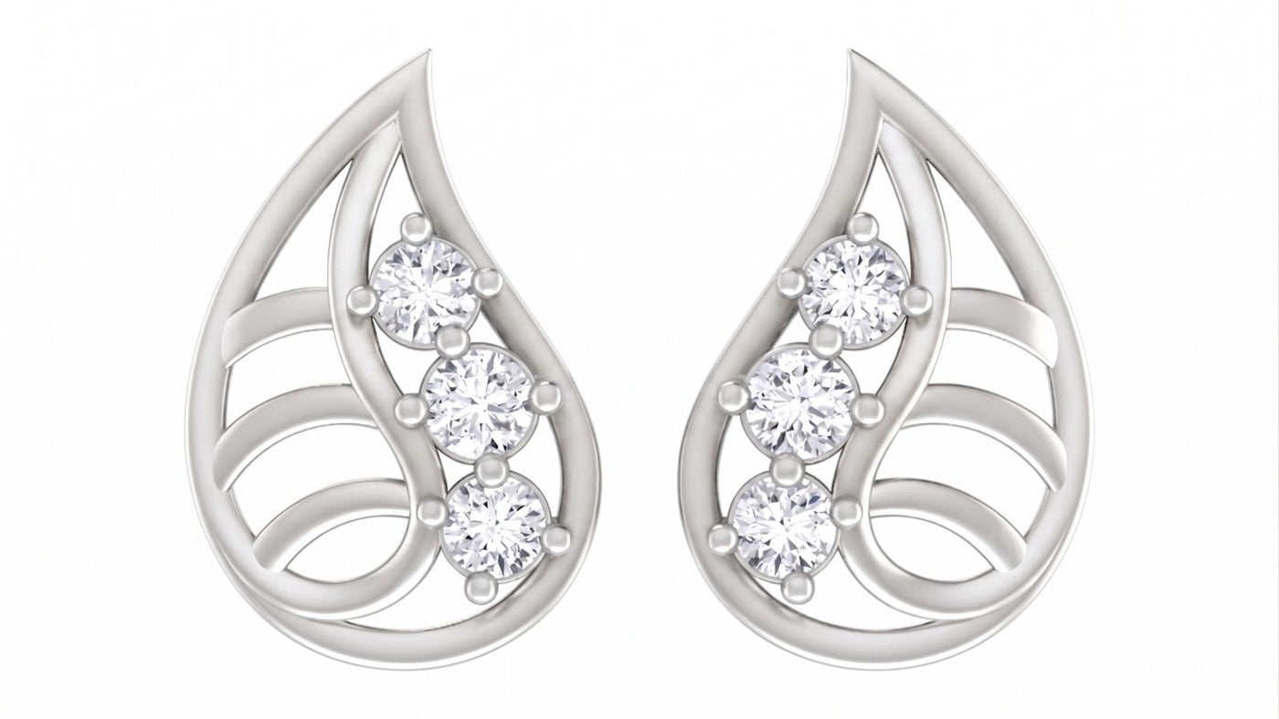 White gold and diamond teardrop-shaped stud earrings on a white background.