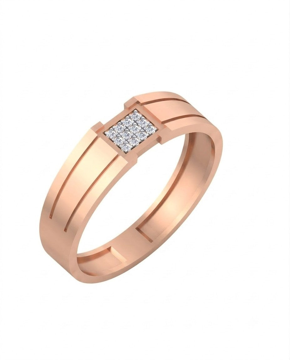 A rose gold ring with a rectangular diamond setting, resting on a light beige marble surface.