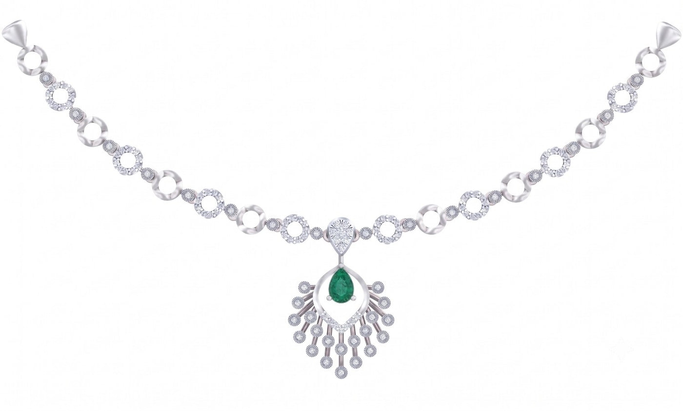 A white gold and diamond necklace featuring a central emerald-cut green teardrop on a white background.