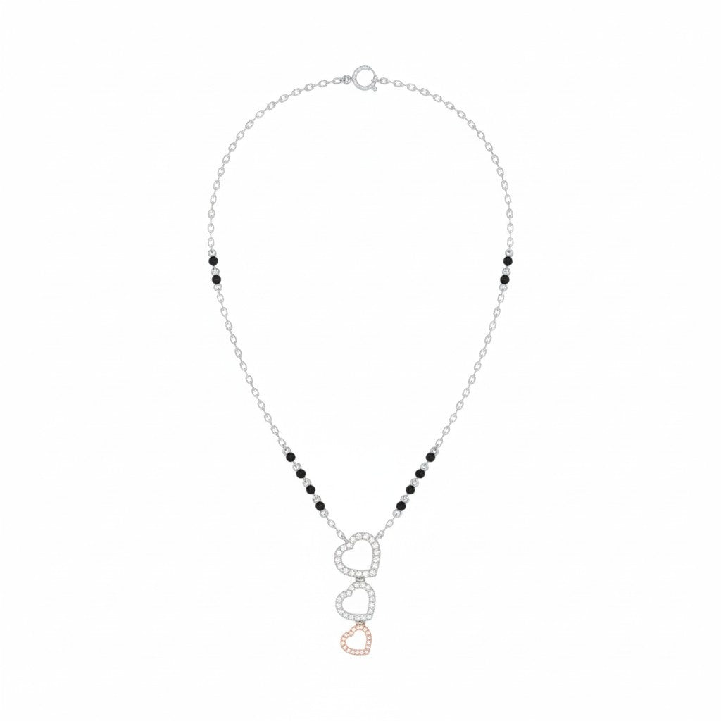 white gold and diamond mangalsutra with heart-shaped mangalsutra on a white background