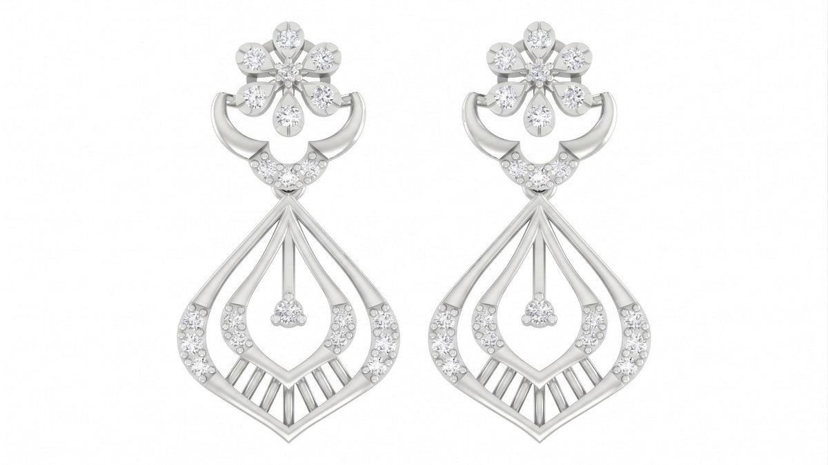 Pair of white gold and diamond earrings with diamond accents on a white background