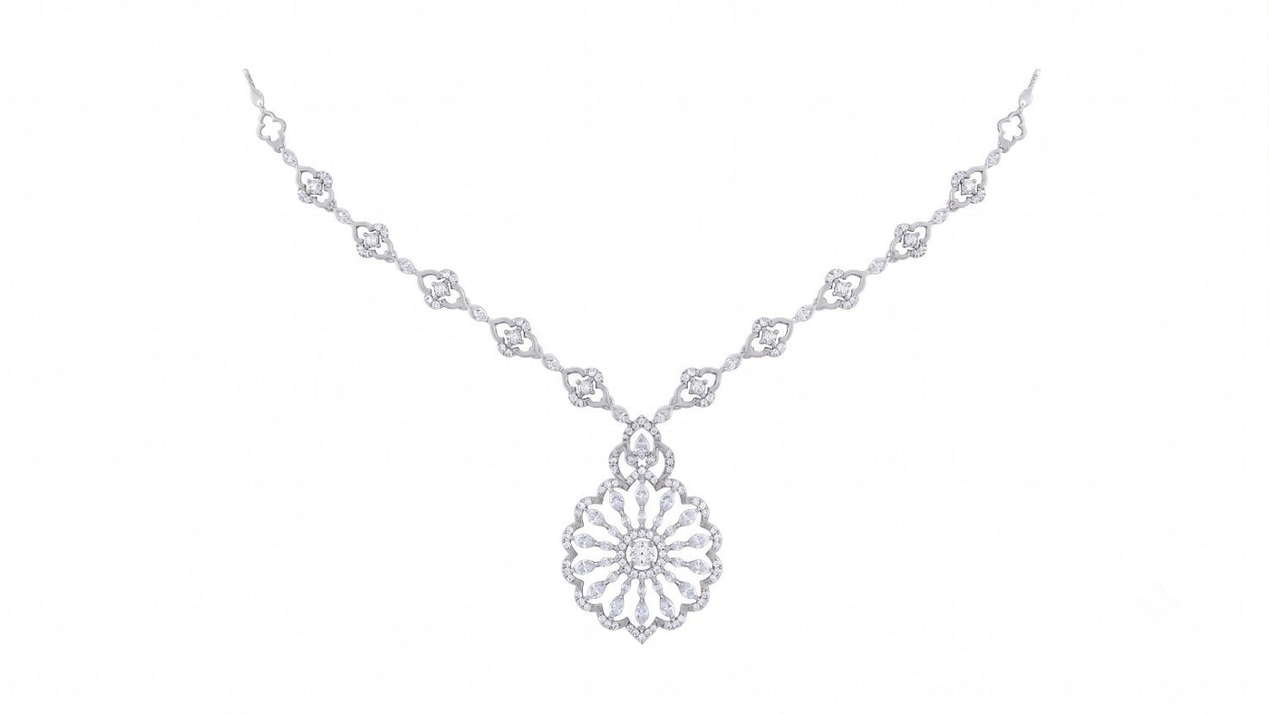 A white gold and diamond necklace with floral design, shown on a plain white background.