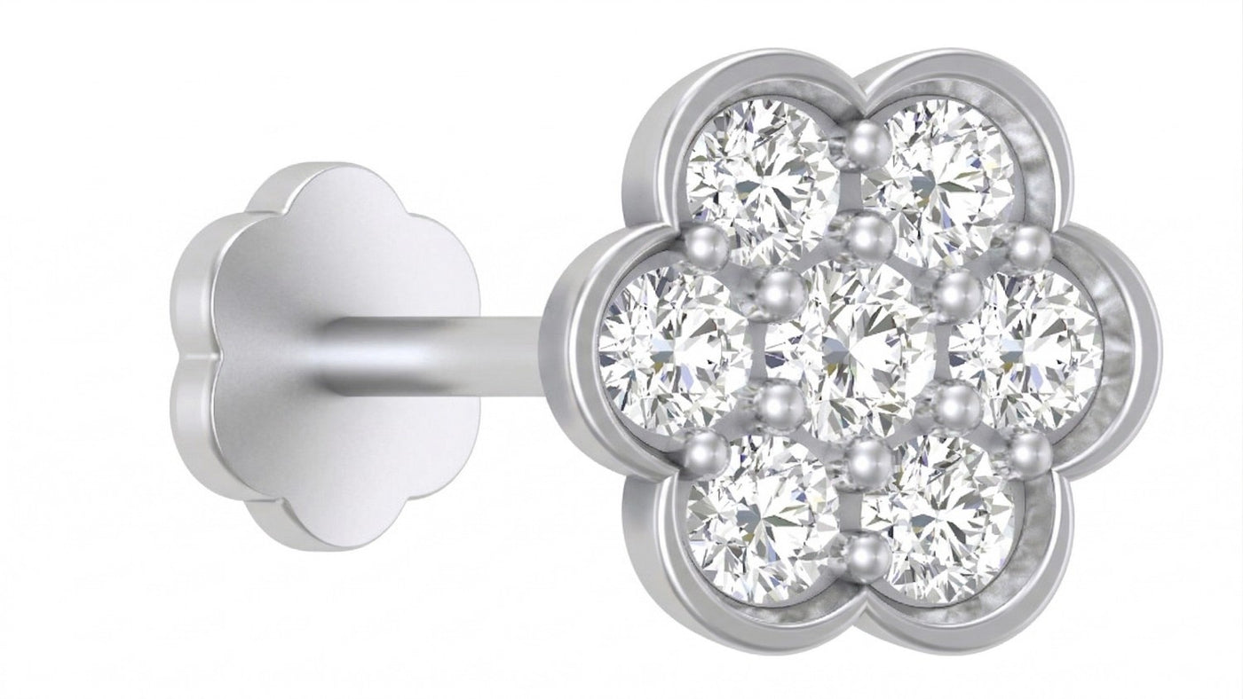 white gold and diamond stud nose pin with diamond accents on a white background