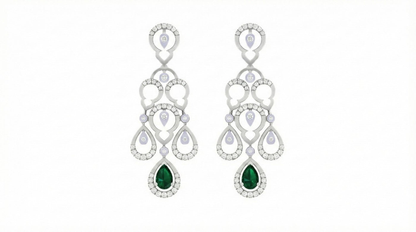 White gold chandelier earrings with emerald and diamond accents on a white background