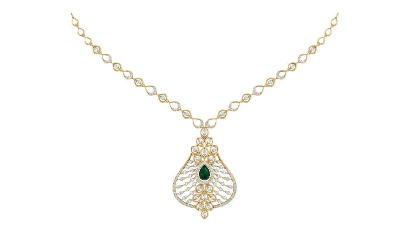 Yellow gold necklace with a green gemstone on a white background