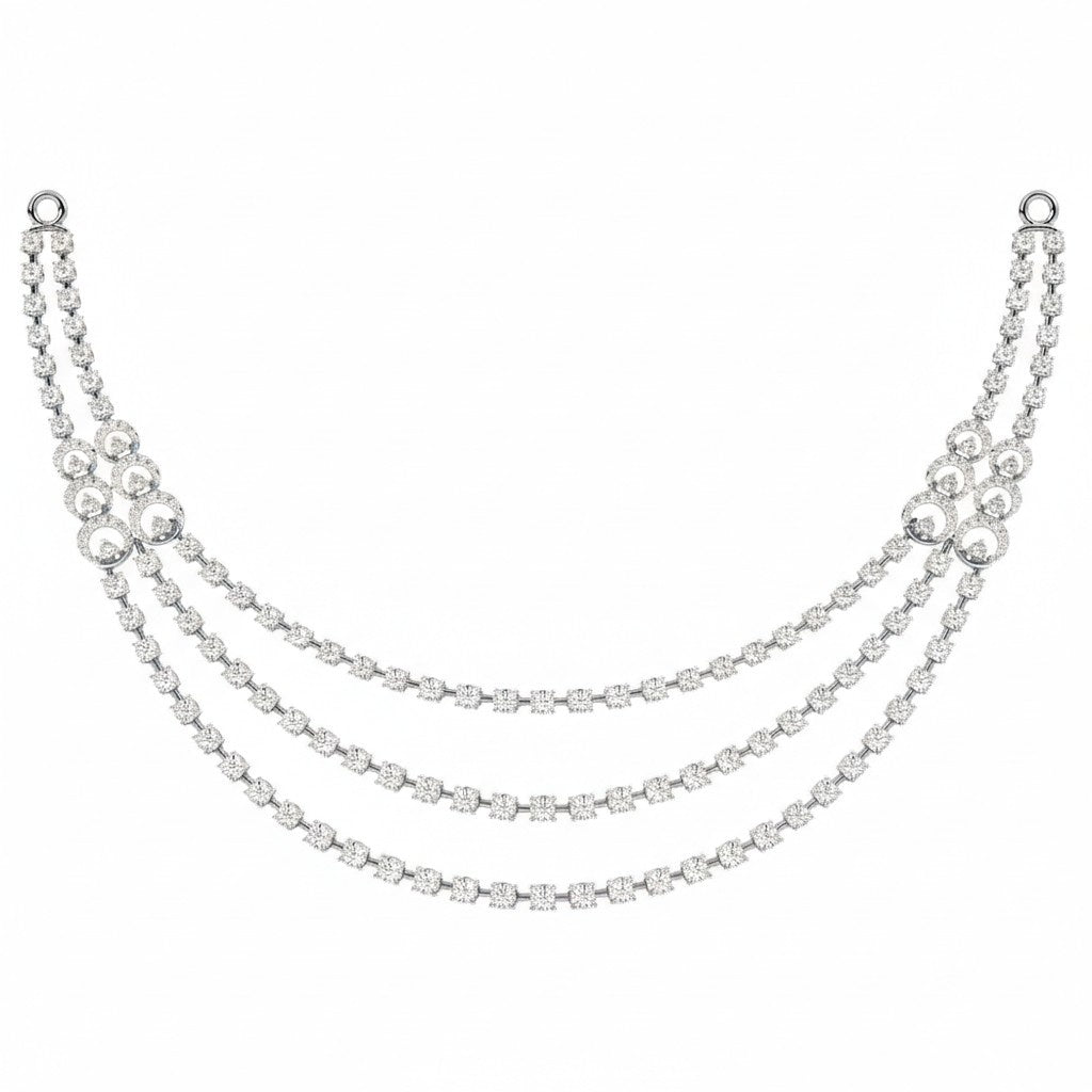 A three-strand white gold and diamond draped necklace on a white background