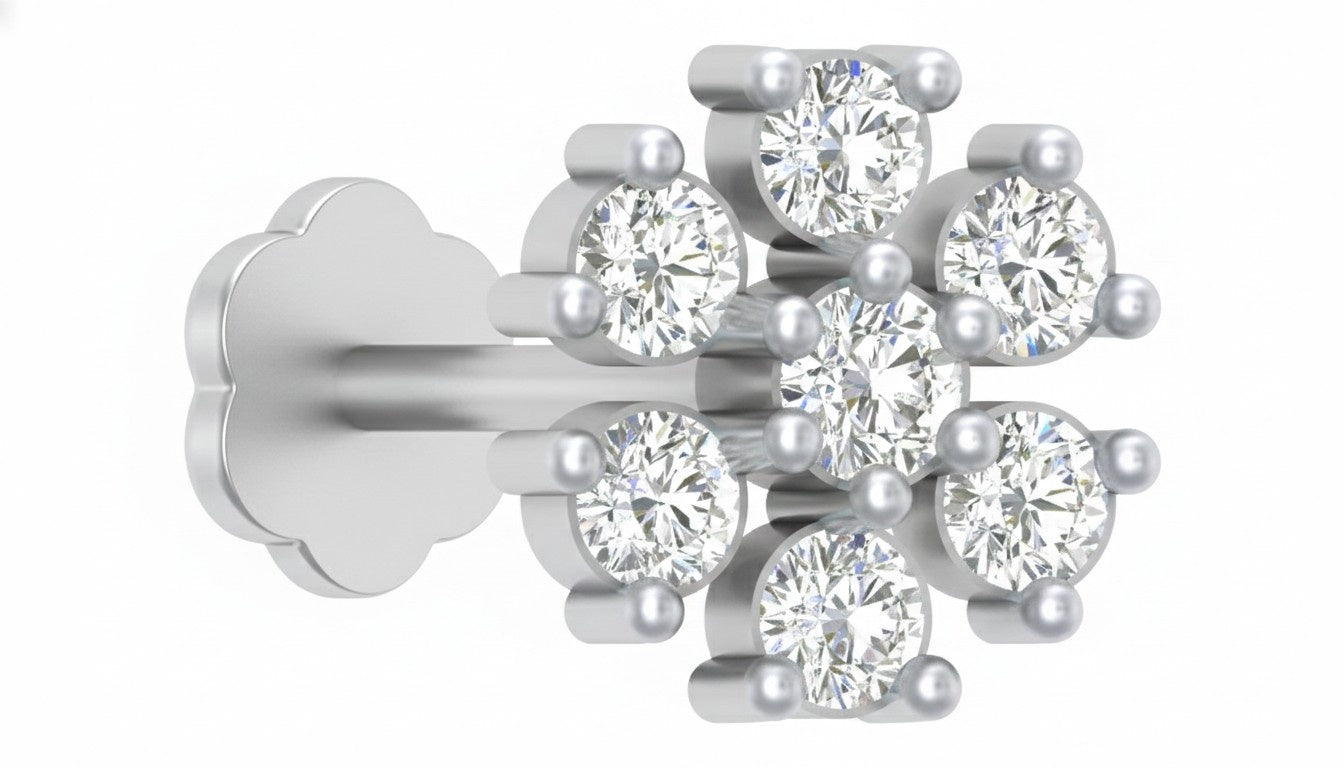white gold and diamond stud nose pin on a white background