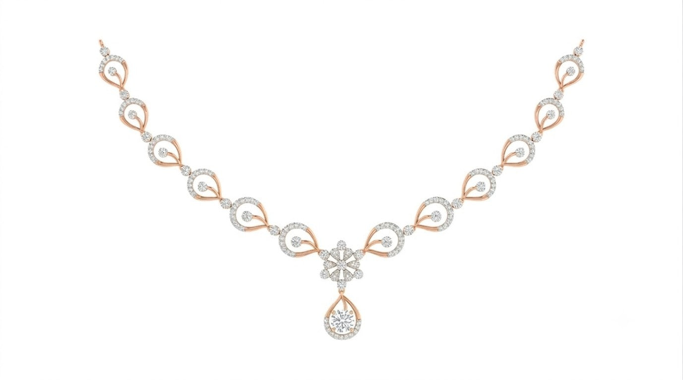 A rose gold and diamond necklace with a teardrop pendant, displayed on a solid white background.