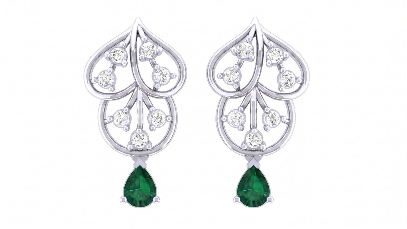 White gold and diamond drop earring with emerald gemstone on a white background.