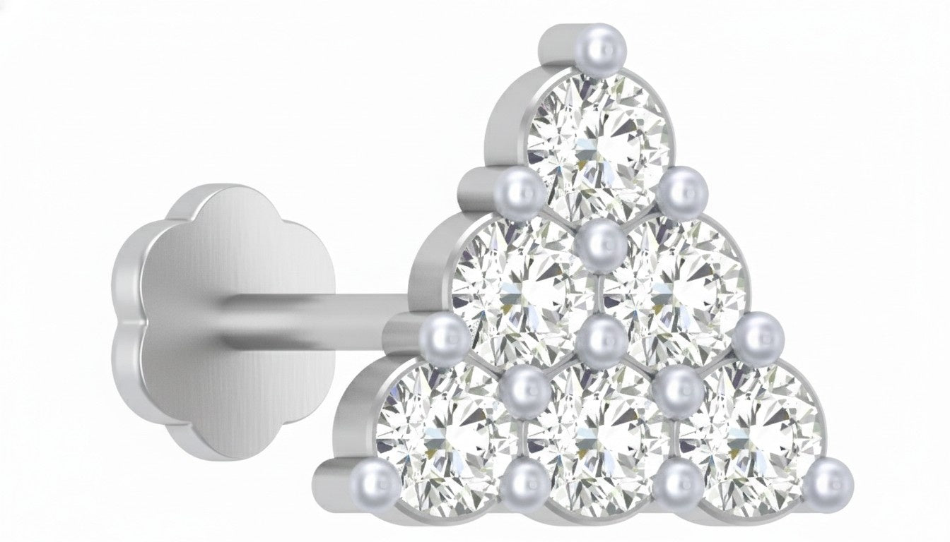 white gold and diamond stud nose pin on a white background