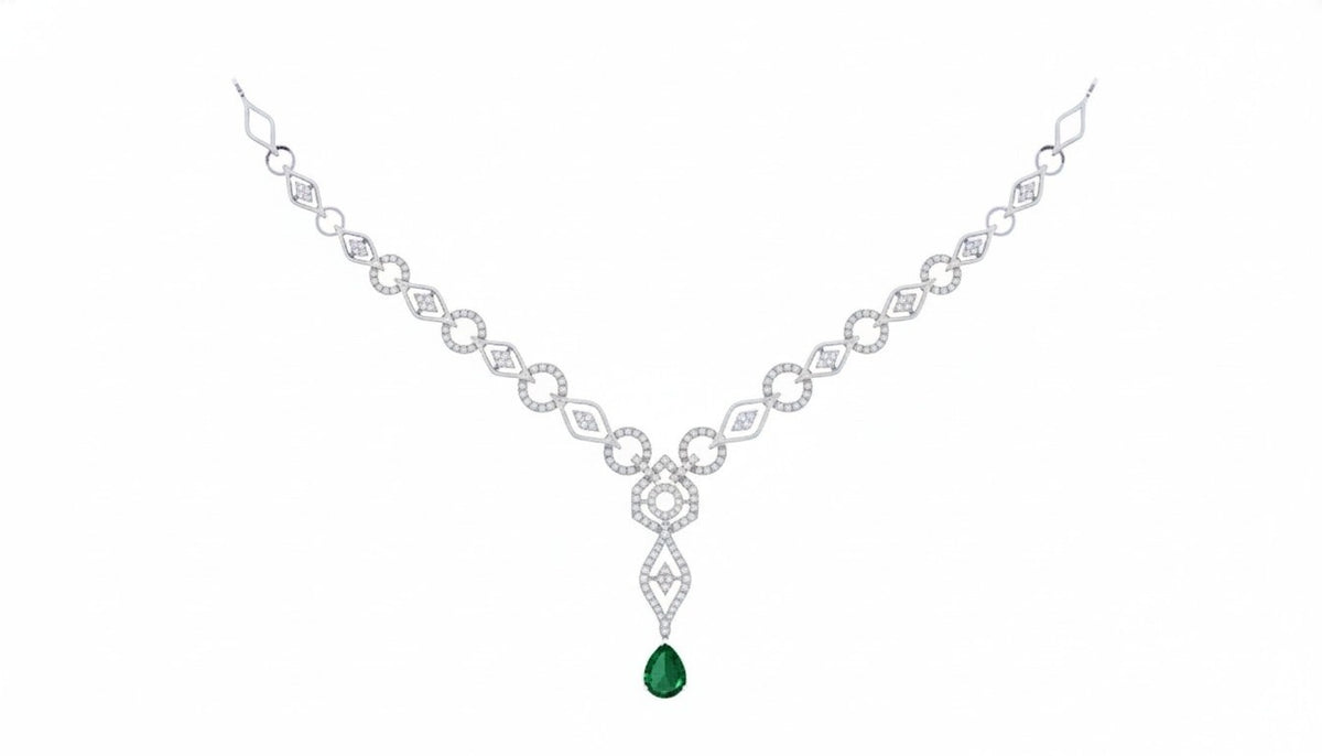 A white gold and diamond necklace featuring a central emerald-cut green gemstone, displayed on a clean white background.