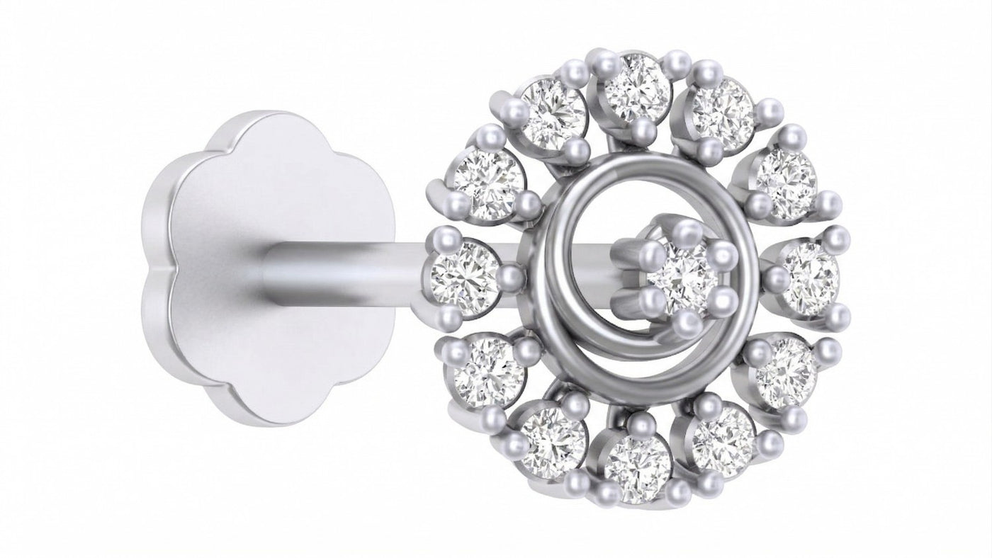 white gold and diamond stud nose pin with a central gemstone on a white background