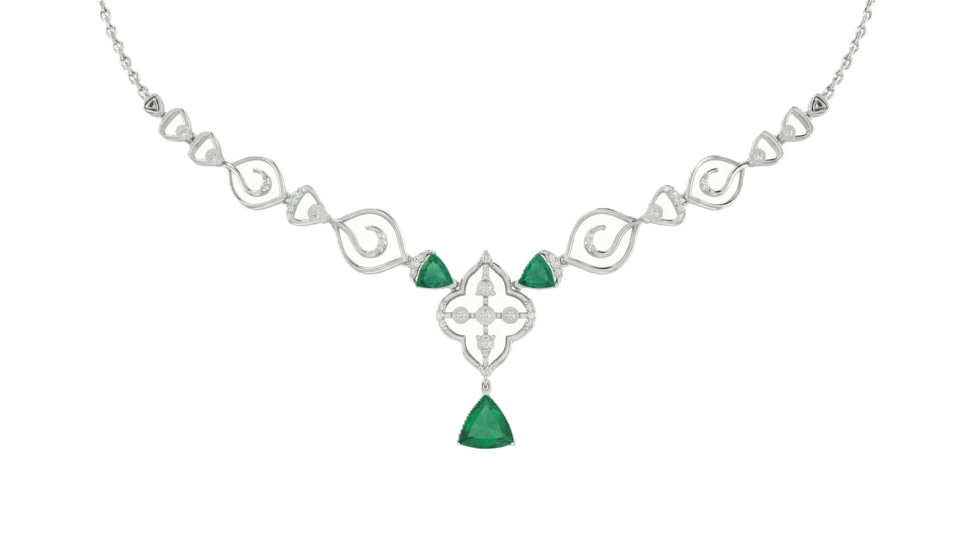 White Gold necklace with three trillion-cut emeralds, diamond accents, and floral pendant drop.