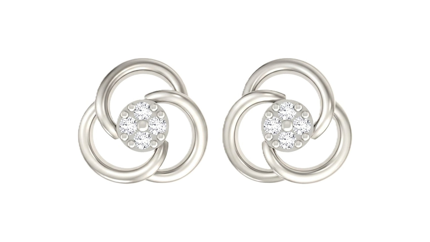 White gold and diamond floral stud  earrings on a white background