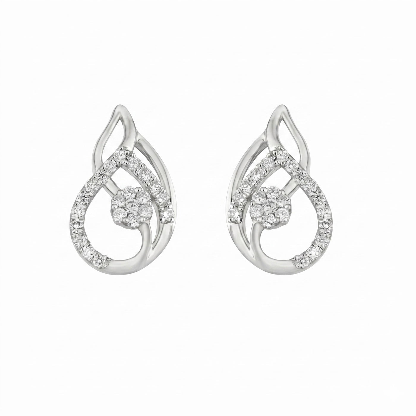 White gold and diamond earrings on a white background