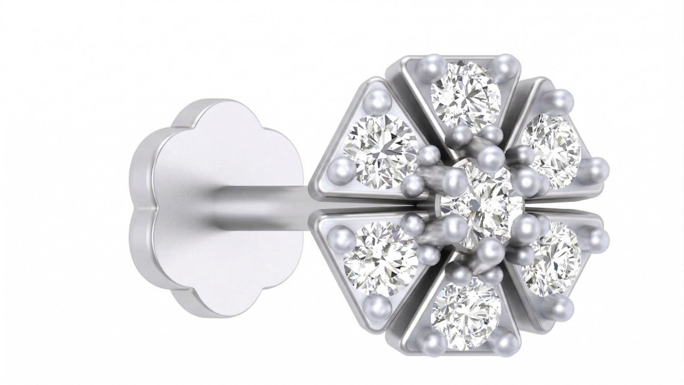 White gold and diamond stud nose pin on a white background
