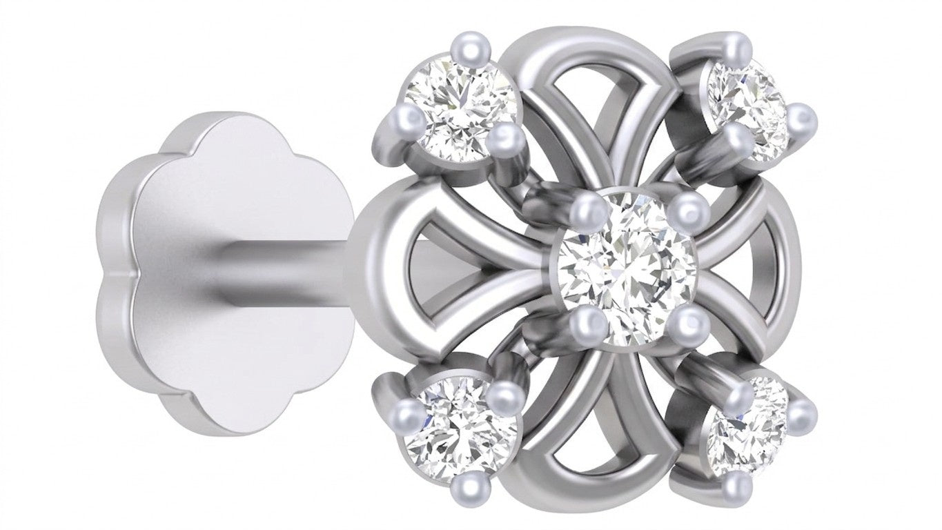 white gold and diamond stud nose pin with diamond accents on a teal background